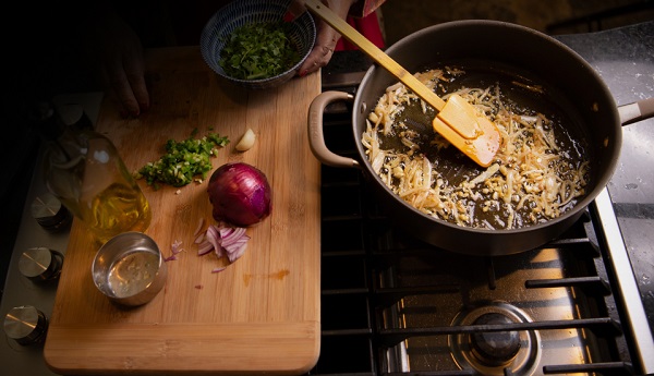 Cooking in kitchen